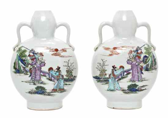 Appraisal: A Pair of Chinese Porcelain Vases each depicting figures in