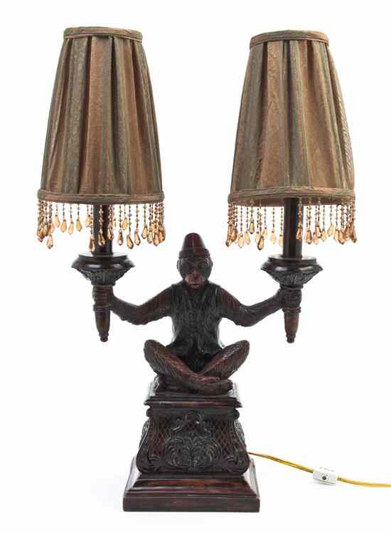 Appraisal: A Resin Figural Two-Light Lamp in the form of a