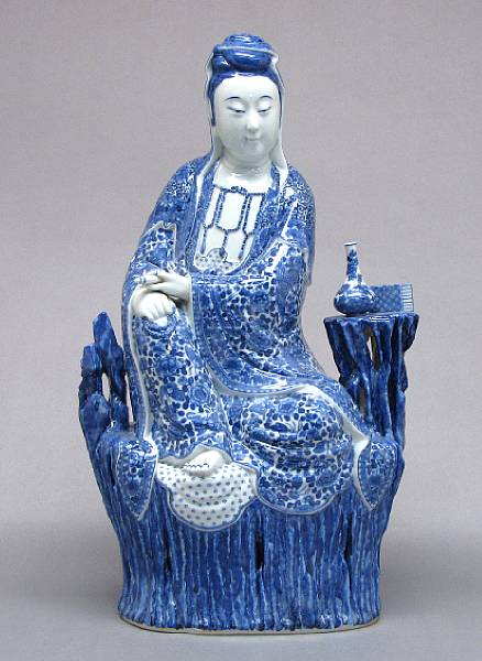 Appraisal: A large blue and white porcelain seated figure of Guanyin