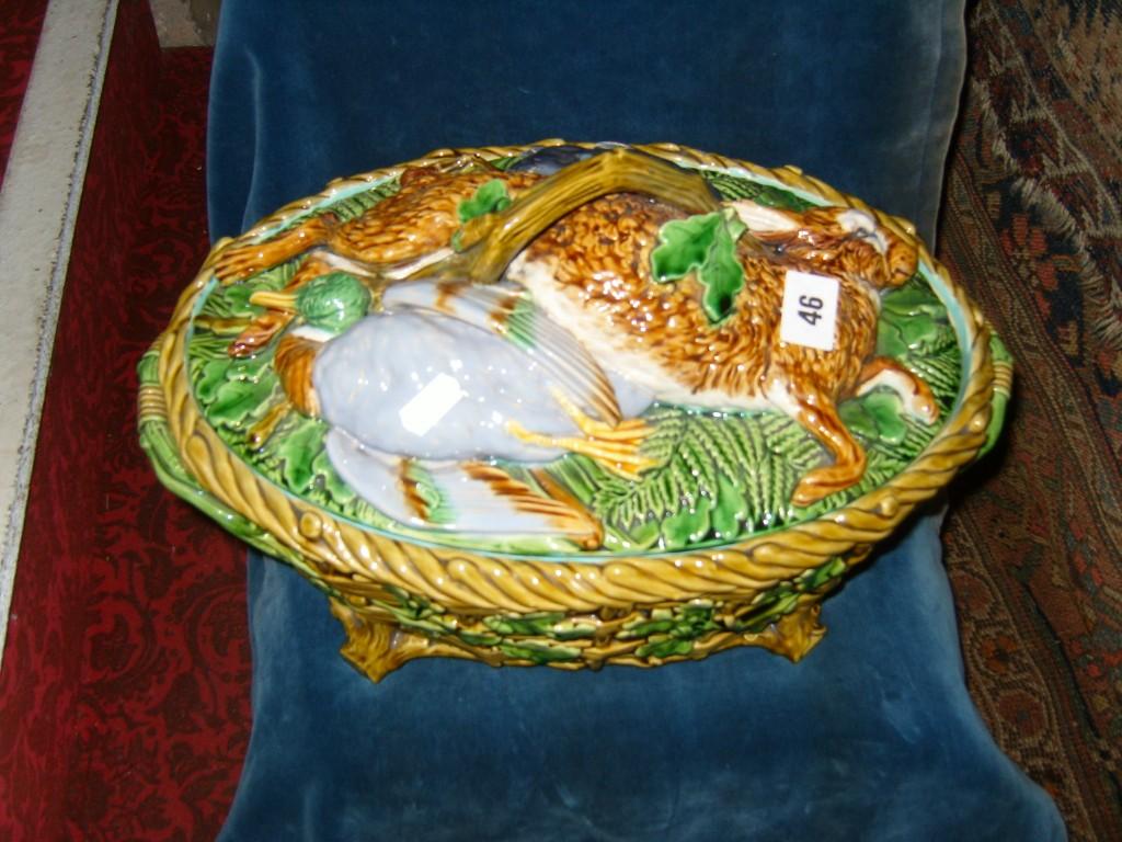 Appraisal: A large th century majolica game dish and cover with