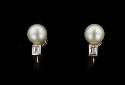 Appraisal: A Pair of Platinum Pearl and Diamond Earrings Platinum mounted