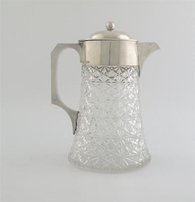 Appraisal: A late Victorian mounted cut-glass cordial jug with a lift-out