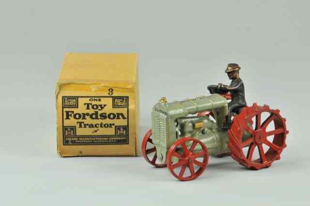 Appraisal: ARCADE FORDSON TRACTOR Cast iron painted in grey with gold