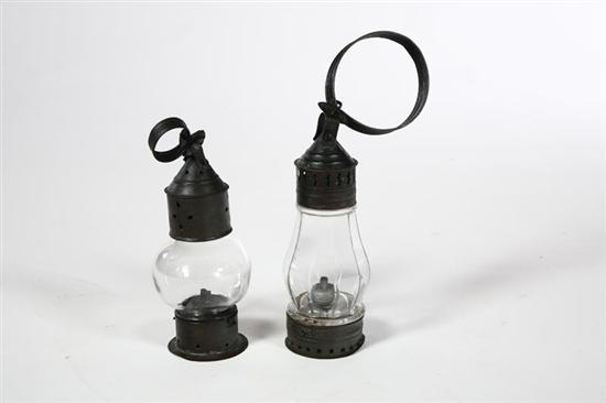 Appraisal: TWO LANTERNS American th century Tin lanterns with clear blown