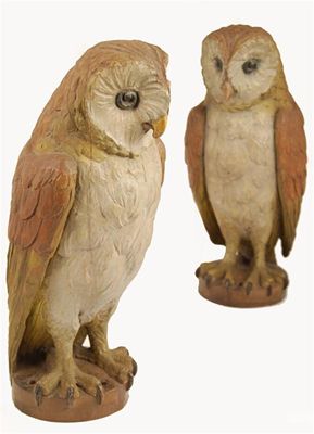 Appraisal: A pair of carved wood and polychrome decorated models of