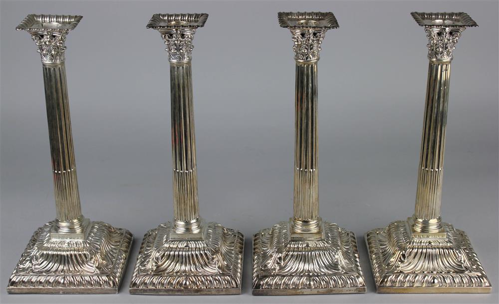 Appraisal: FOUR GEORGE III WEIGHTED SILVER COLUMNAR CANDLESTICKS London - marks