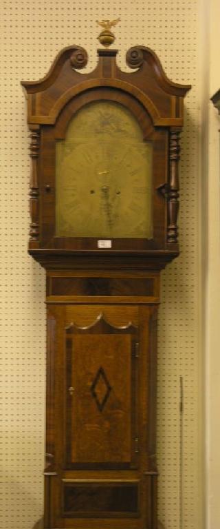 Appraisal: A George III oak and mahogany cross-banded longcase clock eight