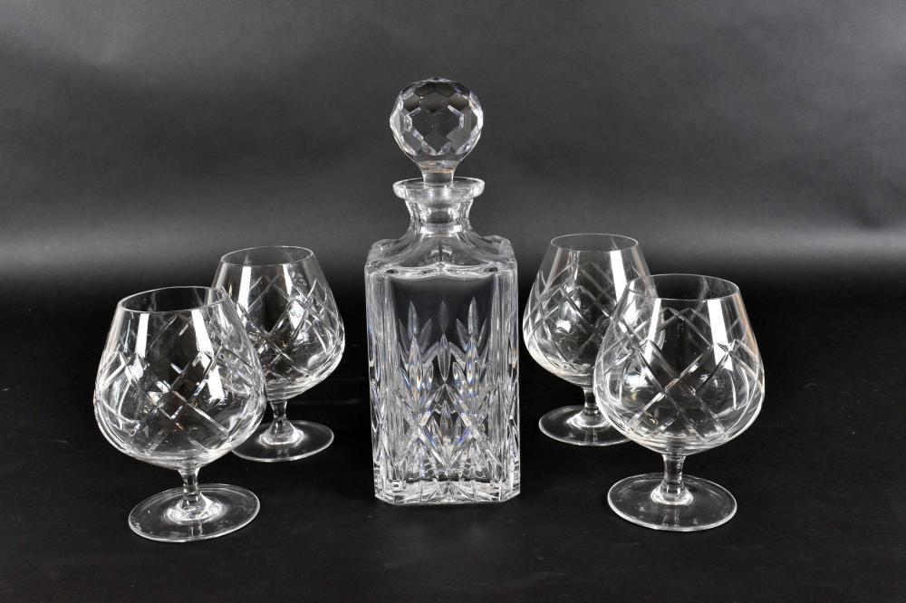 Appraisal: CUT GLASS DECANTER FOUR GLASS BRANDY SNIFFERSEnglish The decanter with