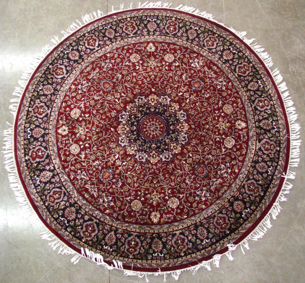 Appraisal: Handmade Oriental Round Area Rug Tabriz design red field with