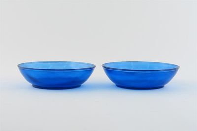 Appraisal: A pair of Chinese blue Beijing glass shallow bowls each