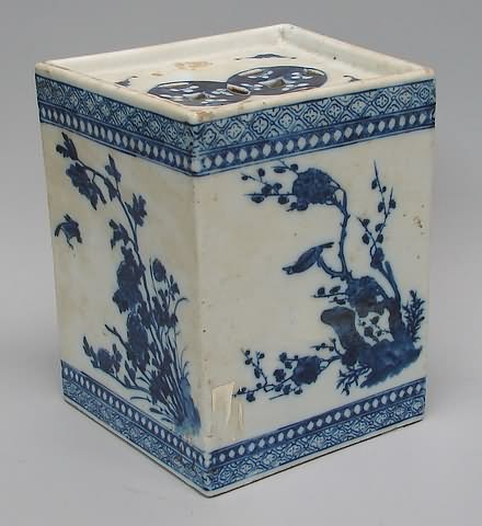 Appraisal: Geometric form with blue and white flower and bird designs