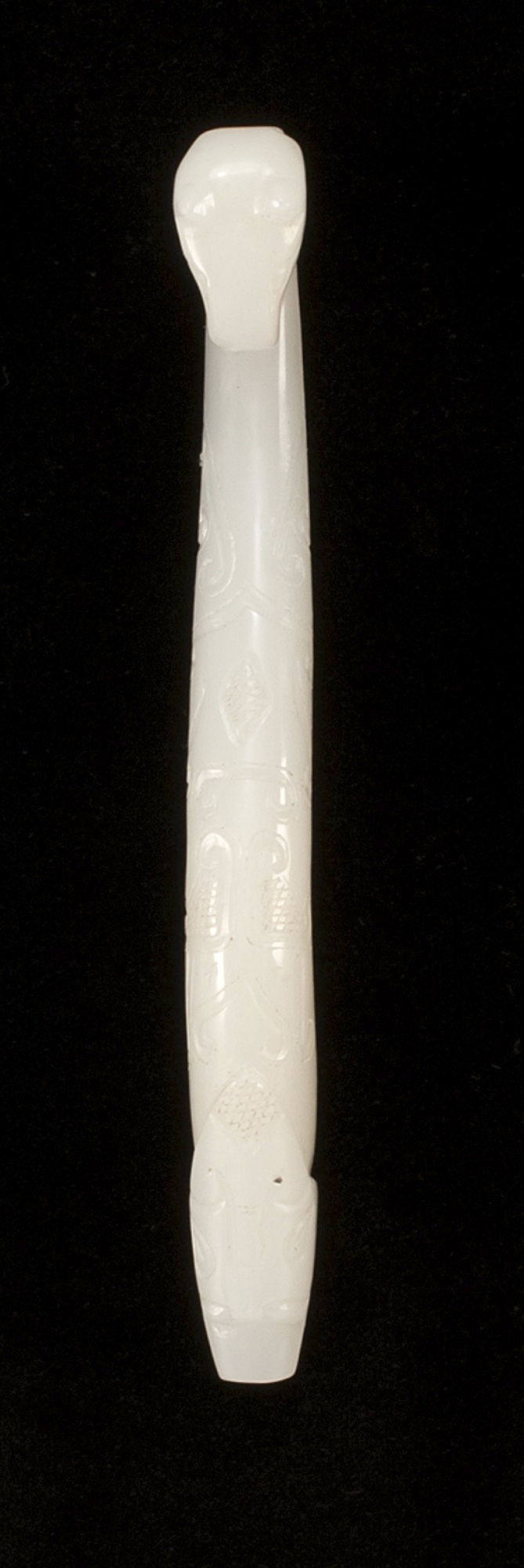 Appraisal: WHITE JADE GIRDLE HOOK With horse's-head carving Length cm ConditionUndamaged