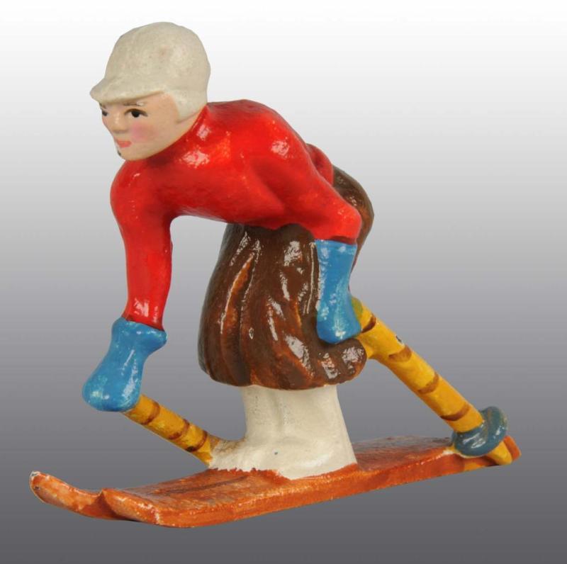 Appraisal: Cast Iron Hubley Ski Jumper Paperweight Description Cat Condition Near