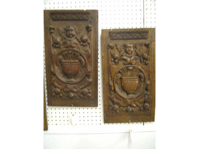 Appraisal: Pair of th Century Carved Plaques cherub floral decor x