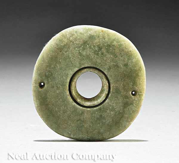 Appraisal: A Large Veracruz Hardstone Ear-Plug c - the flat green