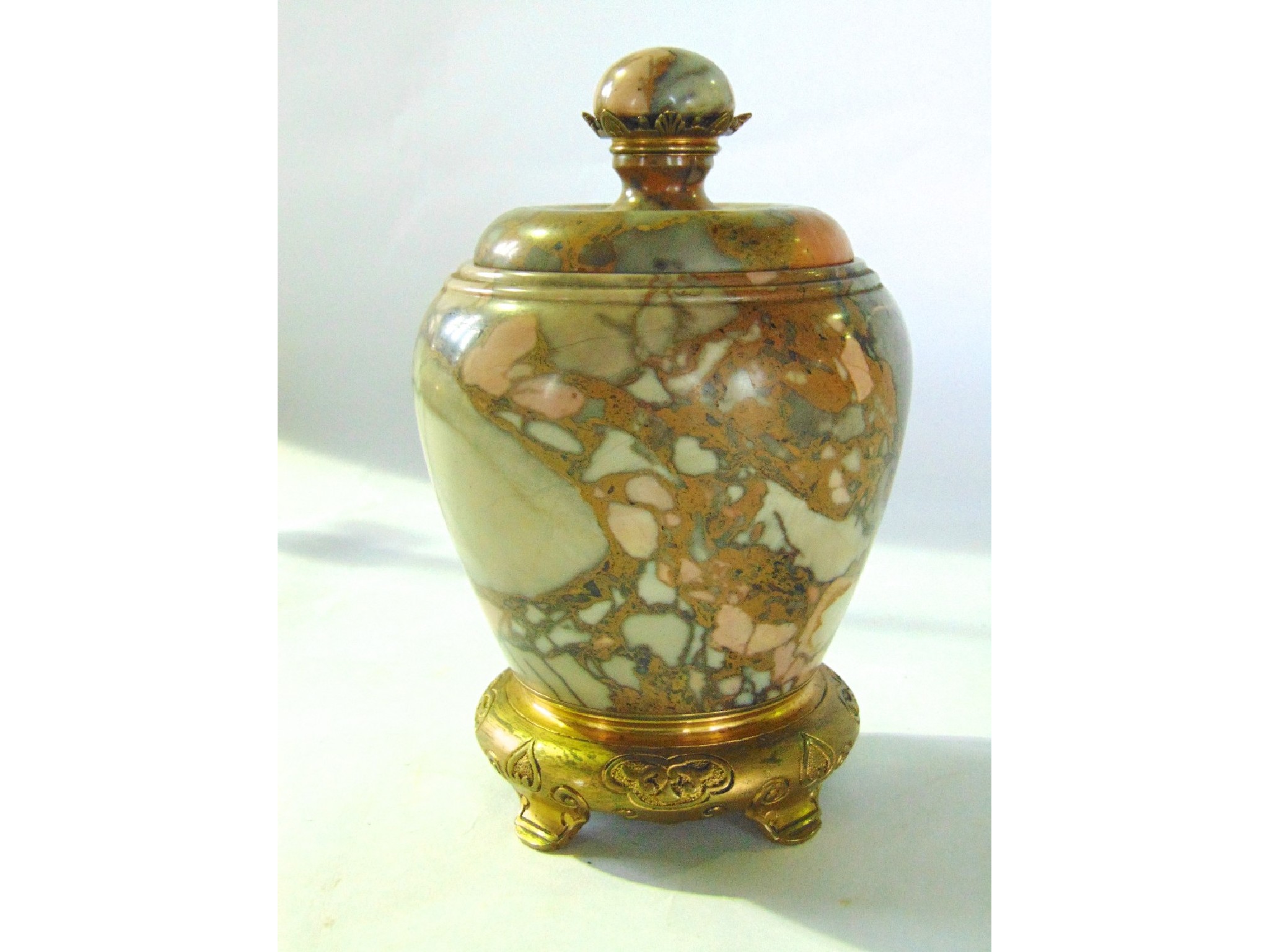 Appraisal: An unusual cut and polished marble lidded jar of tapering