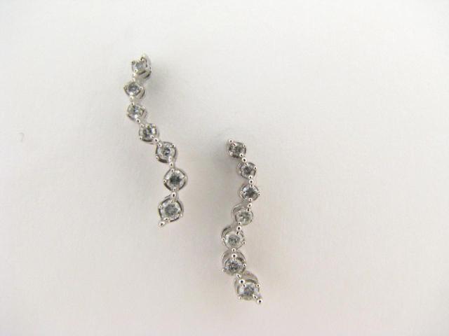 Appraisal: K white gold earrings with seven diamonds each in dangle