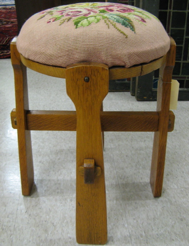 Appraisal: NEEDLEPOINT AND OAK STOOL American Arts Crafts c The stool