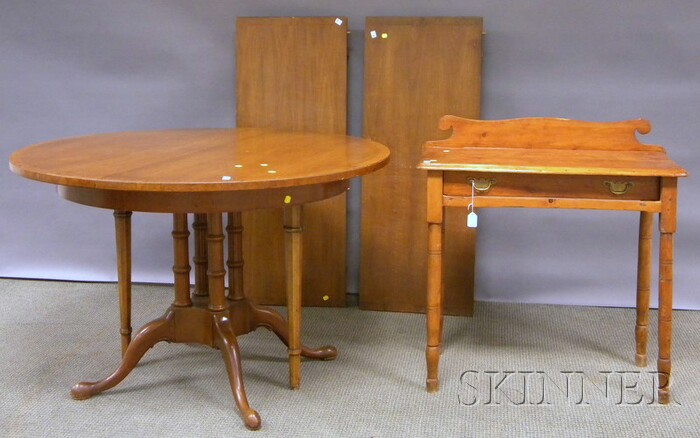 Appraisal: Thomasville Circular Walnut Veneer Pedestal-base Dining Table and a Pine