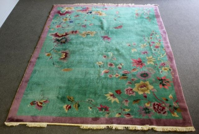 Appraisal: Chinese Art Deco Rug Green background and purple border with