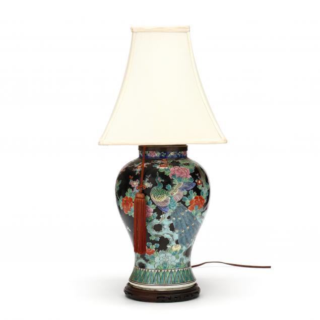 Appraisal: A CHINESE FAMILLE NOIRE VASE WITH PEACOCK LAMP th century