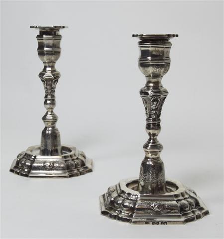 Appraisal: A pair of Victorian silver table candlesticks WC London the