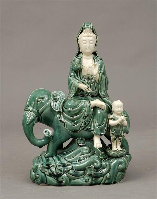 Appraisal: Chinese Green-Glazed Porcelain Figure of Guanyin Seated on Elephant x