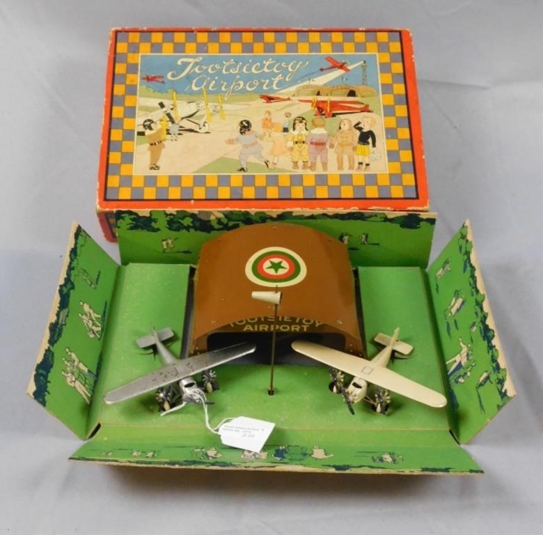 Appraisal: TOOTSIETOY AIRPORT ORIGINAL BOX WITH COLOREDlithograph cover ca s Contains