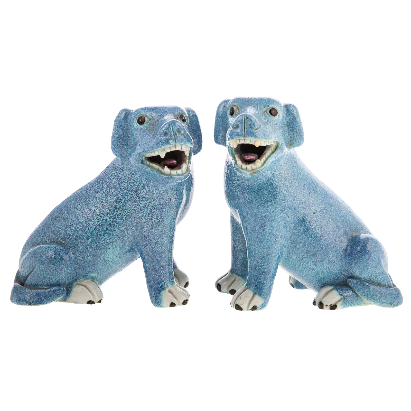 Appraisal: A PAIR OF CHINESE PORCELAIN POWDER BLUE DOGS Seated dogs