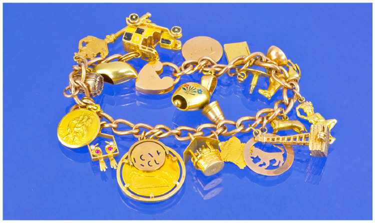 Appraisal: ct Gold Charm Bracelet Loaded With Charms Comprising Key Motor