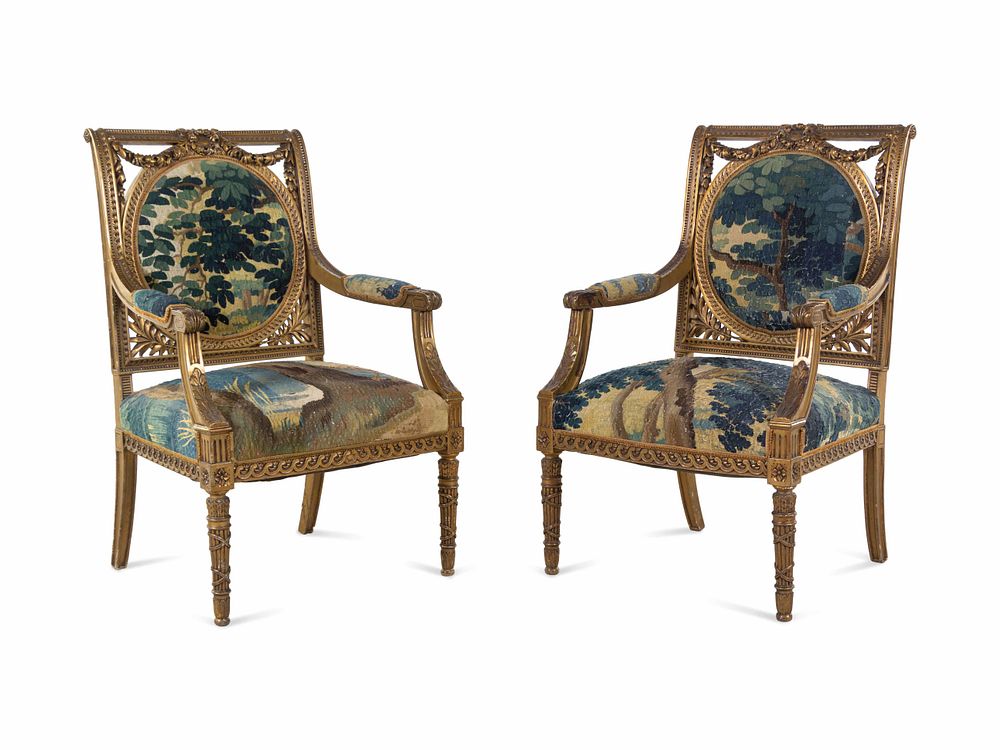 Appraisal: A Pair of Louis XVI Style Fauteuils A Pair of