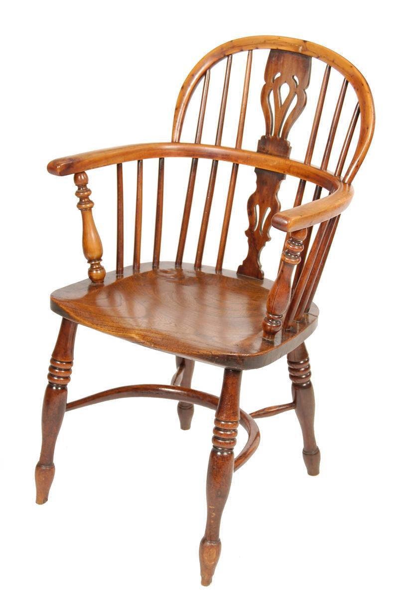 Appraisal: A th century Windsor yew low back armchair