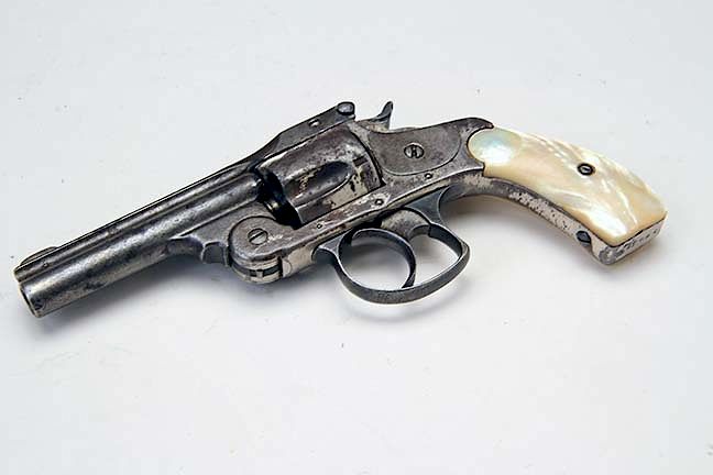 Appraisal: S and W Revolver Pearl grips SN This gun requires