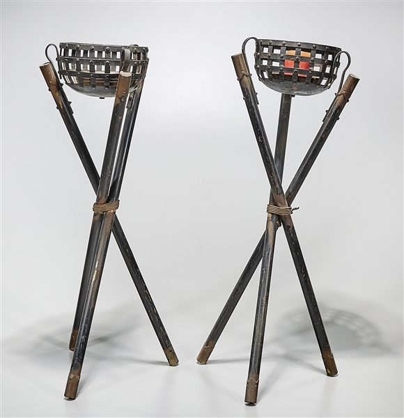 Appraisal: Pair of Chinese metal tripod candle holders x x each