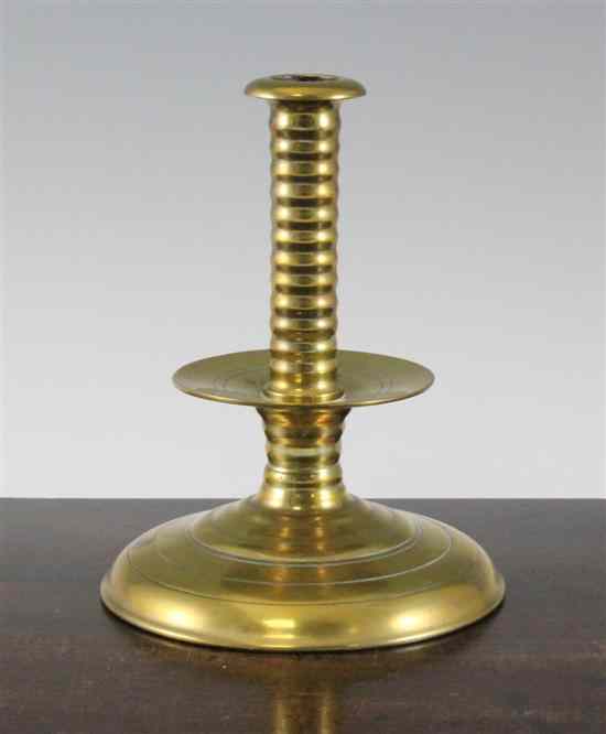 Appraisal: A late th century style brass candlestick with ribbed column