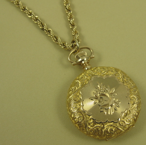 Appraisal: FOURTEEN KARAT GOLD PENDANT WATCH AND CHAIN The K gold