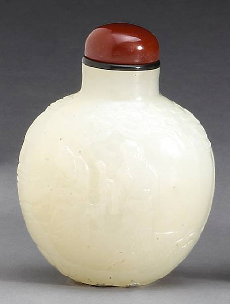 Appraisal: A carved white jade snuff bottle th th Century Well-hollowed