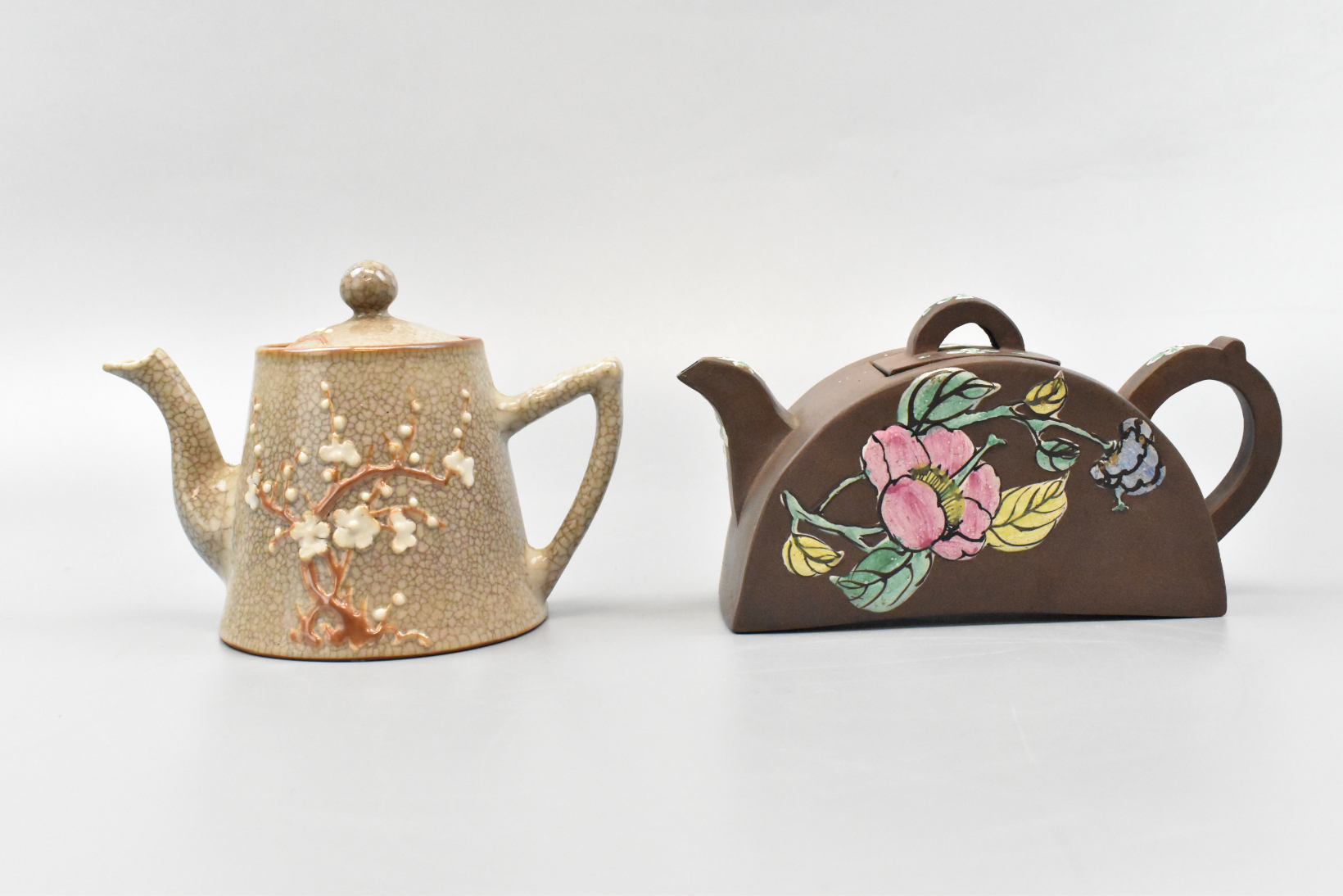 Appraisal: Two Chinese teapot one zisha enamel and one Ge glazed