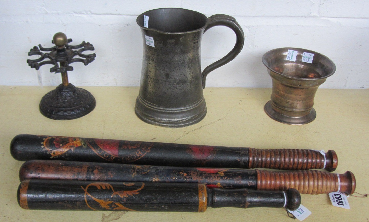 Appraisal: A Victorian policeman's truncheon stamped FIELD HOLBORN cm another similar