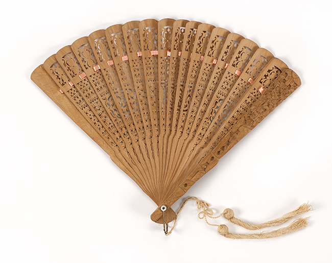 Appraisal: PIERCED SANDALWOOD BRIS FOLDING FAN Chinese Late th CenturySticks pierced