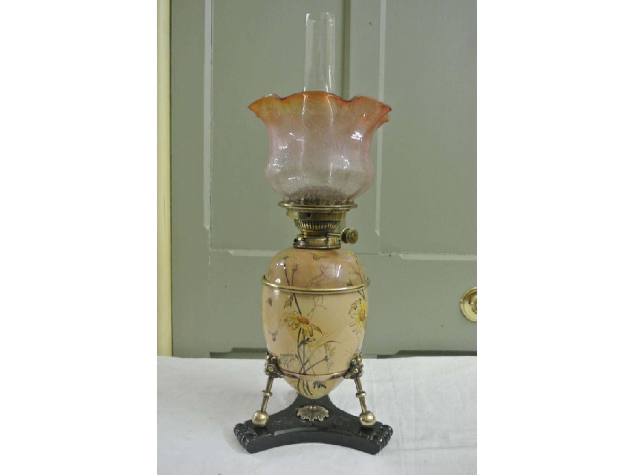 Appraisal: A late th century Aesthetic movement ceramic oil lamp and