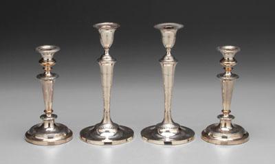 Appraisal: Two pairs silver-plated candlesticks round with tapering posts one with