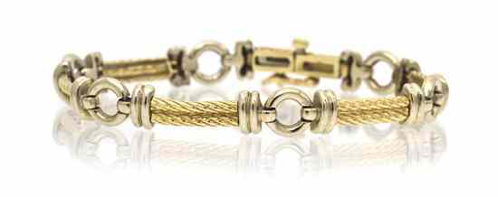 Appraisal: A Karat Gold Link Bracelet consisting of alternating white gold