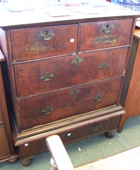 Appraisal: An early th century walnut chest on stand the crossbanded