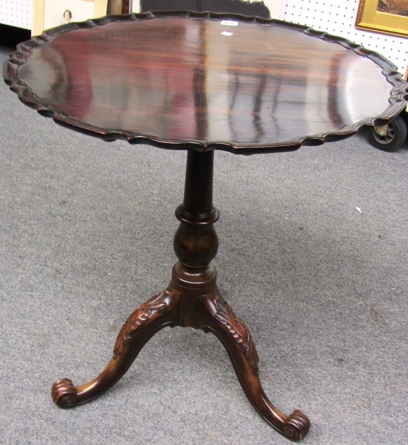 Appraisal: A th century mahogany occasional table the shaped snap top