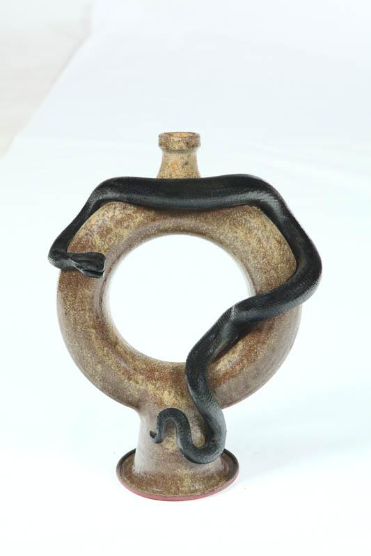 Appraisal: GROTESQUE DONUT FLASK American th century redware Incised Marvin Bailey