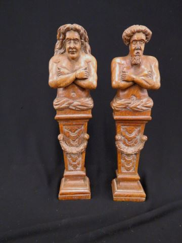 Appraisal: Pair of Carved Wooden Figurines Man Woman architectual style classical