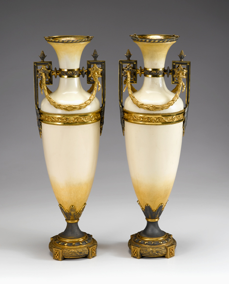 Appraisal: Pair of French gilt and patinated bronze mounted enameled metal