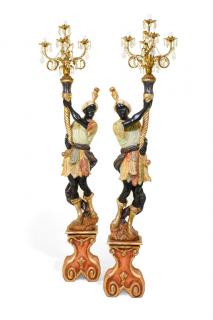 Appraisal: A PAIR OF VENETIAN STYLE PAINTED AND PARCEL GILTWOOD BLACKAMOOR