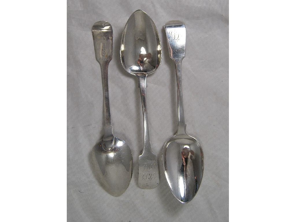 Appraisal: Three fiddle pattern silver serving spoons Exeter and approx oz